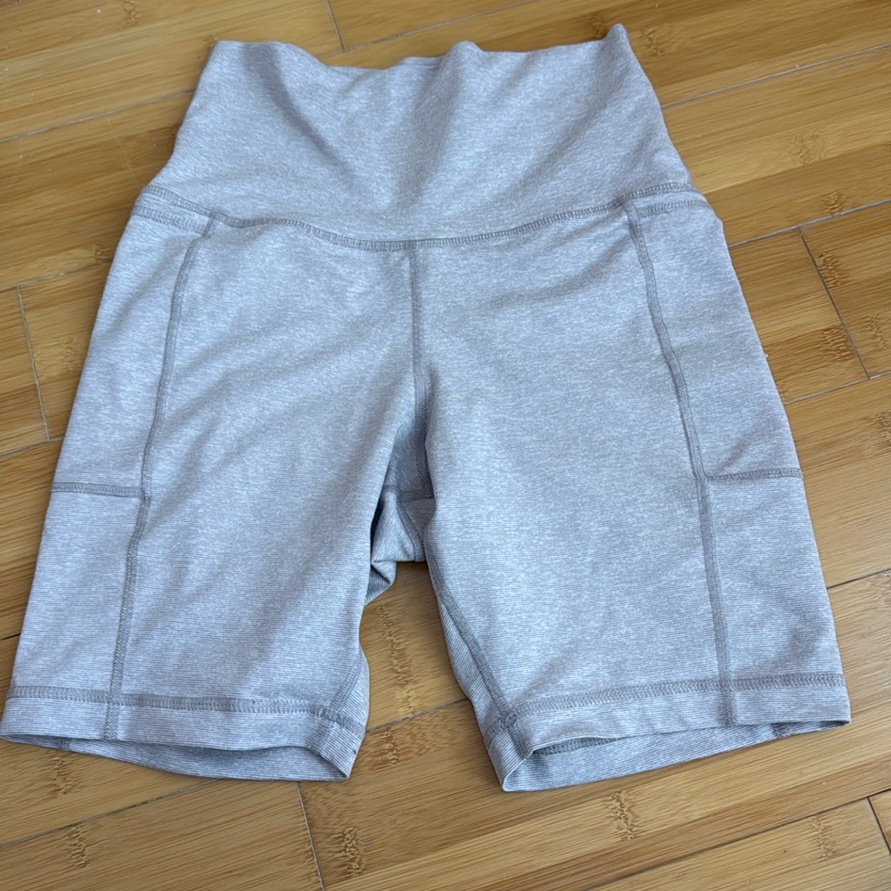 Vuori Heather Light Gray High-Waist Bike Shorts
